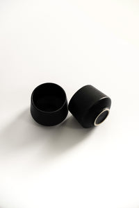 Minimalist black ceramic coffee cups