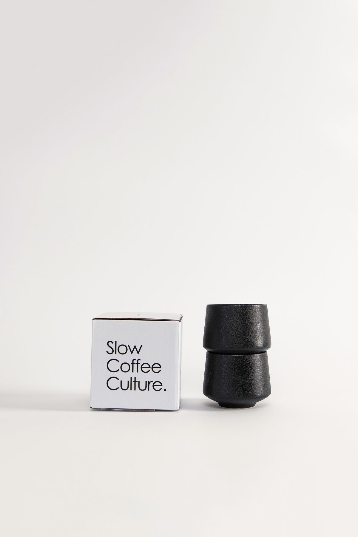Minimalist black ceramic coffee cups